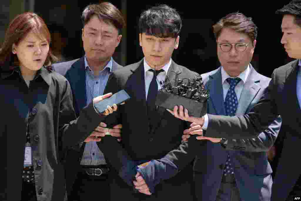 Seungri, a former member of the popular K-pop boy band Big Bang, is taken into custody as he leaves the High Court in Seoul, South Korea. The 28-year-old is linked to a police investigation into Burning Sun, a nightclub where he was a public relations director. Workers there are alleged to have filmed women with hidden cameras and used alcohol and drugs to sexually attack them.