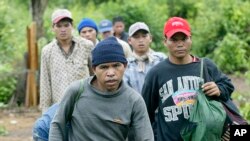 Montagnards emerge from the forest after having fled from neighbouring Vietnam in Korng village, Ratanakiri province, northeastern Cambodia, 10 kilometers (6.3 miles) from the Vietnamese border, file photo. 