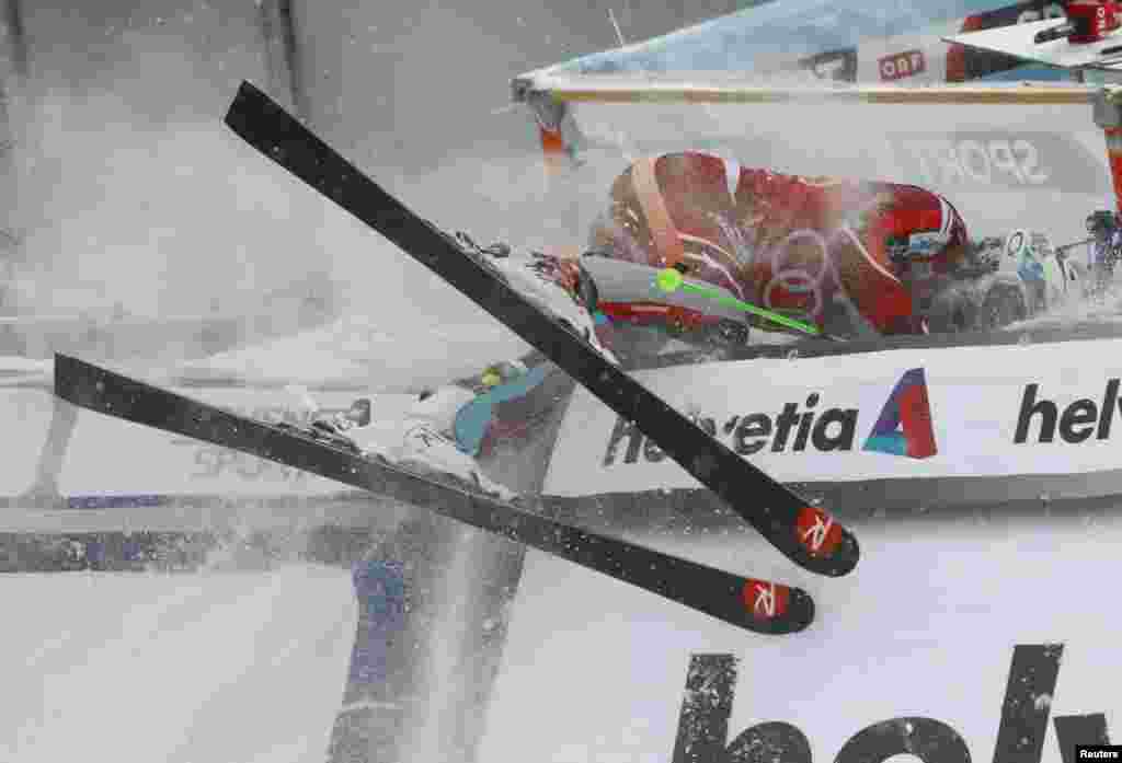 Henrik Kristoffersen of Norway crashes into the barrier after winning the men&#39;s Alpine Skiing World Cup slalom in Wengen, Switzerland.