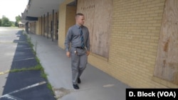Paulin’s top priority is to restore business in some boarded up buildings along the highway.