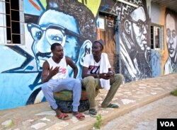 Babacar Gueye, at the Hip Hop Center in the suburb of Guediawaye, where ex-convicts learn French, as well as the skills used in being disc jockeys or making films. (A. Grovestins/VOA)