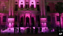 The City Hall in Cape Town, South Africa, is lit up in purple on Dec. 28, 2021, in memory of Anglican Archbishop Desmond Tutu. 