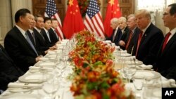 도널드 트럼프 미국 대통령과 시진핑 중국 국가주석이 지난 1일 아르헨티나에서 열린 주요20개국(G20) 정상회의에서 별도회담을 하고 있다. 