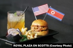 Royal Plaza on Scotts' grilled Trump-Kim Burger is made up of a minced chicken, seaweed and kimchi patty, served with Korean rice rolls and fries.