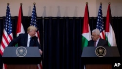 Palestinian president Mahmoud Abbas and President Donald Trump deliver a statement following their meeting in the West Bank city of Bethlehem, May 23, 2017.