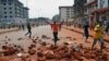 Supporters of a Guinea opposition party clash with police as they protest against president Alpha Conde on May 10, 2012 in Conakry.