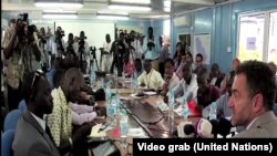 FILE- Reporters pack into the Erick de Mul conference room in Juba for a news conference by acting UNMISS head Toby Lanzer on Aug. 28, 2014. 