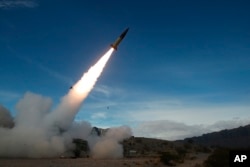 FILE - U.S. Army soldiers conduct live fire testing of an ATACMS (Army Tactical Missile System) at White Sands Missile Range, New Mexico, Dec. 14, 2021. (John Hamilton/U.S. Army)