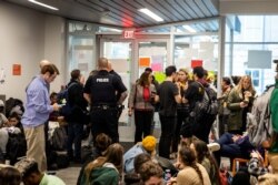 Students rally against white supremacy at Syracuse University in New York, Nov. 20, 2019.