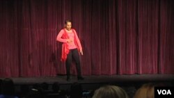 Storyteller Linda Gorham performs the story, "Fat Cat," for about 100 children at a Virginia community center.