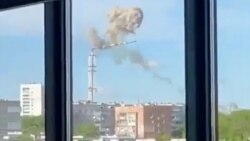 Smoke rises as a TV tower collapses after what local officials said was a missile attack, amid Russia's attack on Ukraine, in Kharkiv, Ukraine April 22, 2024, as seen in this screen grab taken from a video.