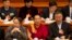 FILE - Gyaltsen Norbu, the Chinese government-appointed 11th Panchen Lama, center, sits with fellow delegates before the closing ceremony of the Chinese People's Political Consultative Conference (CPPCC) at the Great Hall of the People in Beijing, March 13, 2015.