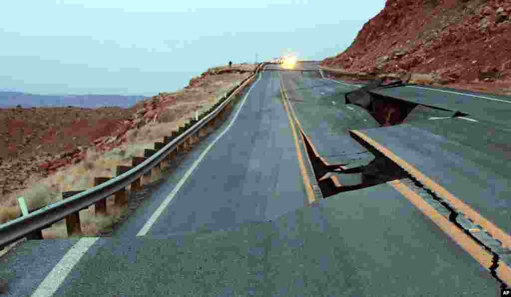 The buckling of U.S. 89 is seen about 25 miles south of Page, Arizona, Feb. 20, 2013. Arizona Department of Transportation (ADOT) says what caused a 150-foot section of pavement to buckle might be what ADOT called a &quot;geologic event.&quot; (Photo provided by ADOT)