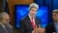 Secretary of State John Kerry (center) speaks at the State Department in Washington, D.C., during a news conference to announce the 2013 Annual Report on International Religious Freedom, July 28, 2014.
