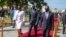 Le président haïtien Jovenel Moise, au centre, accompagné de son épouse Martine, et du Premier ministre Joseph Jouthe, à Port-au-Prince, Haïti.
