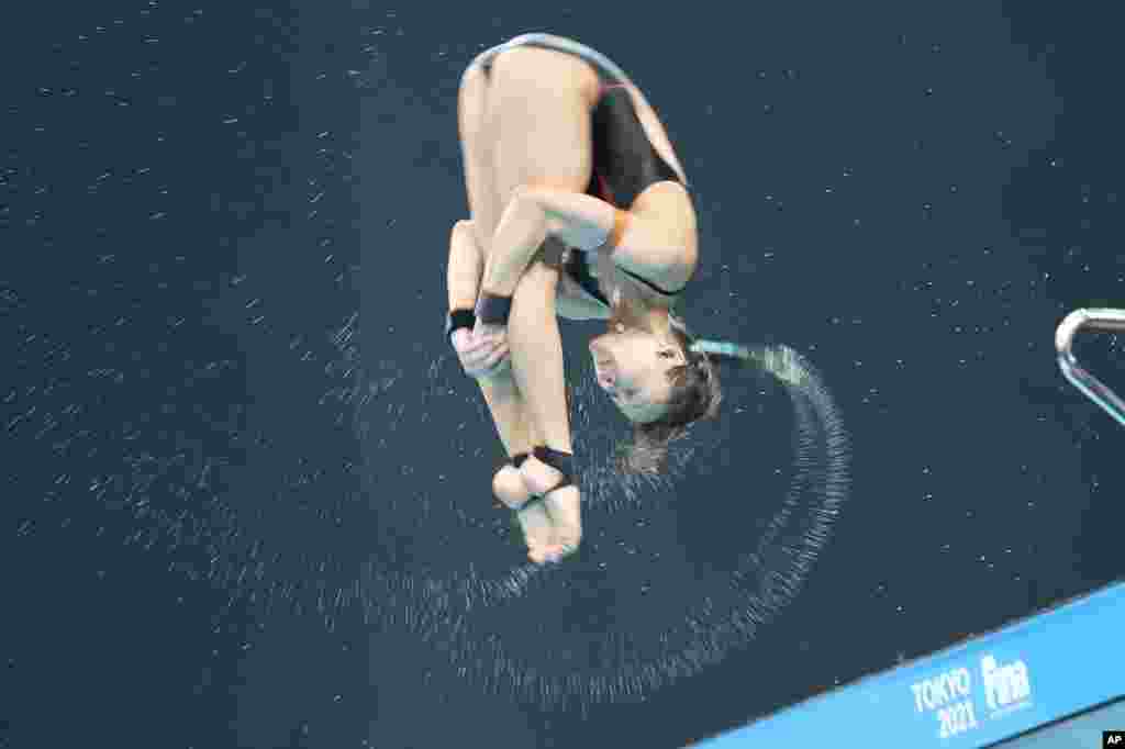 Pandelela Pamg of Malaysia performs a dive during the Women's 10m Platform final at the FINA Diving World Cup in Tokyo, Japan.