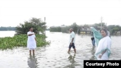West Bengal Chief Minister Mamata Banerjee visits flood areas.