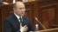 Moldova's Prime Minister Valeriu Strelet addresses members of parliament in Chisinau, October 29, 2015.