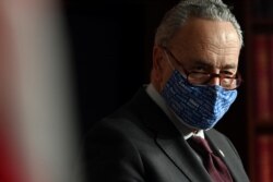 FILE - U.S. Senate Majority Leader Chuck Schumer (D-NY) looks on during a news conference at the U.S. Capitol, in Washington, Feb. 2, 2021.