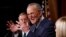 FILE: Senate Majority Leader Charles Schumer, D-NY.,at podium gestures as Sen. Dick Durbin, D-Il., left, and Sen. Patty Murray, D-Wash., right, listen at the Capitol, Jan. 21, 2020, in Washington. On Thursday, Schumer got an OK of the debt limit bill, avoiding a U.S. default. 