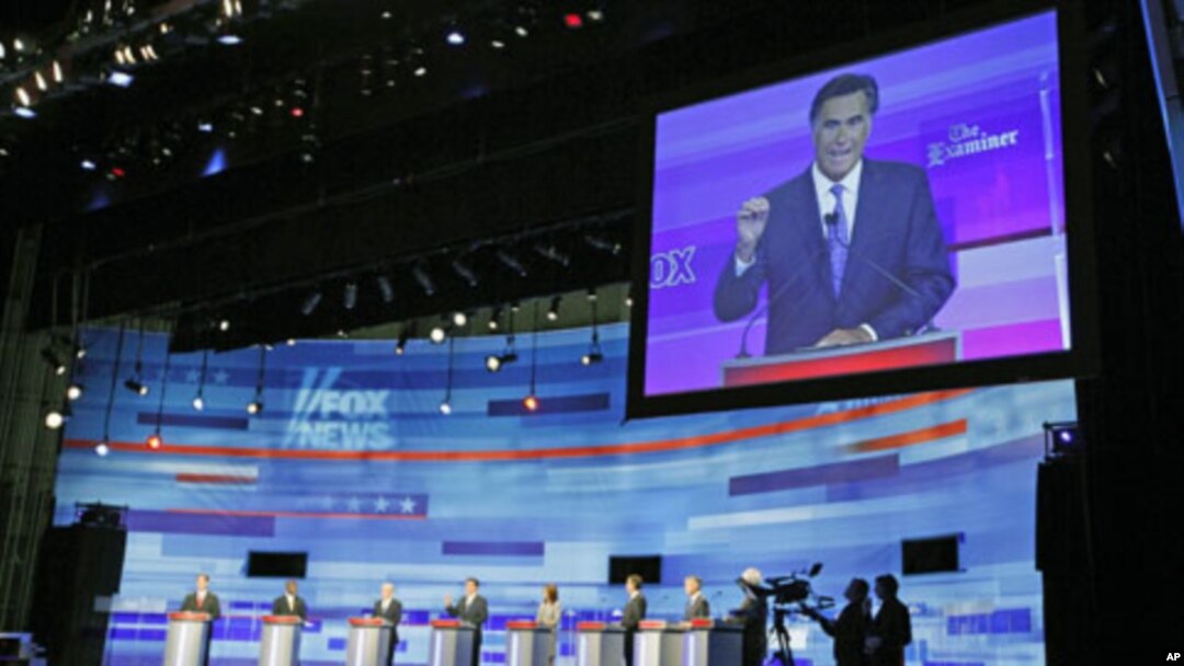 US Republican presidential candidate Mitt Romney is seen on the screen during the presidential candidate debate in Ames, Iowa, August 12, 2011 (file photo)