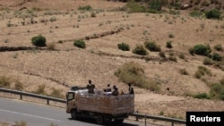 Troops in Eritrean uniforms are seen on top of a truck near the town of Adigrat, Ethiopia. Taken 3.21.2021