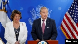 Ronald Johnson, newly appointed U.S. Ambassador to El Salvador, participates in a news conference with his wife Alina at El Salvador International Airport in San Luis Talpa, El Salvador, Sept. 4, 2019. 