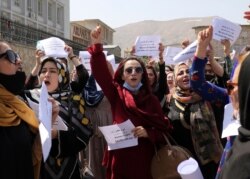Women gather to demand their rights under the Taliban rule during a protest in Kabul, Afghanistan, Sept. 3, 2021.