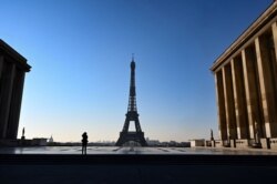 This picture taken on April 1, 2020, shows the Eiffel Tower and deserted Esplanade du Trocadero in Paris, on the 16th day of a strict lockdown in France to stop the spread of COVID-19.