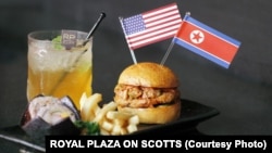 Royal Plaza on Scotts' grilled Trump-Kim Burger is made up of a minced chicken, seaweed and kimchi patty, served with Korean rice rolls and fries. 