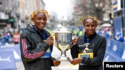 Evans Čebet i Helen Obiri iz Kenije - pobednici Bostonskog maratona 2023. (Foto: Eric Canha - USA Today Sports.)