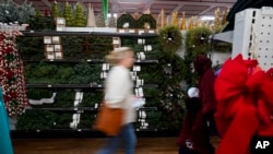 FILE - Holiday decorations are displayed at Blackhawk Hardware on Wednesday, Nov. 1, 2023, in Charlotte, North Carolina. 