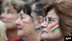 Supporters of the opposition 'TISZA' party rally in Budapest, Hungary, to protest what they call "government propaganda," Oct. 5, 2024.