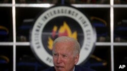 U.S. President Joe Biden speaks during a meeting as he tours the National Interagency Fire Center in Boise, Idaho, U.S., September 13, 2021.
