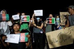 Afghan migrants demonstrate against the Taliban takeover of Afghanistan, on the island of Lesbos, Greece, August 16, 2021.