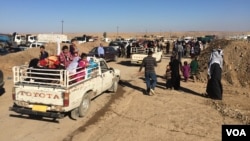 Many arriving families found relatives either in the camp or waiting in the parking lot, after more than two years of separation on Nov. 3, 2016, at the Khazir camp in Kurdish Iraq. (H. Murdock/VOA)