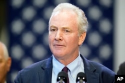 FILE - Senator Chris Van Hollen, D-Md., speaks at Prince George's Community College, Center for the Performing Arts, September 14, 2023, in Largo, Md.