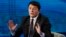 FILE - Former Italian prime minister Matteo Renzi gestures during a TV program, in Milan, Italy, Feb. 26, 2017.