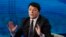 FILE - Former Italian Prime Minister Matteo Renzi speaks during a television appearance in Milan, Italy, Feb. 26, 2017.