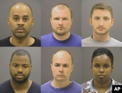 FILE - Baltimore police officers charged in Freddie Gray's death, top row from left, Caesar Goodson Jr., Garrett Miller and Edward Nero, and bottom row from left, William Porter, Brian Rice and Alicia White.