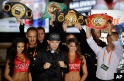 Gennady Golovkin poses on stage during the fighter arrivals in Las Vegas, Sept. 12, 2017. Mexico's popular Saul "Canelo" Alvarez squares off Saturday against Gennady Golovkin in a long-anticipated middleweight bout as part of the Mexico Independence Day celebration.