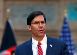 FILE - U.S. Defense Secretary Mark Esper, speaks during a news conference on Feb. 29, 2020.