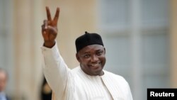 FILE - Gambian President Adama Barrow leaves the Elysee Palace after a meeting with French leaders in Paris, March 15, 2017. 