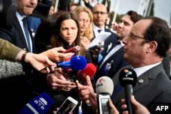 French President Francois Hollande speaks to reporters at the Southern EU countries summit held at Belem cultural center in Lisbon, Portugal, Jan. 28, 2017.