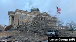 Damage from a storm through that rolled through the night before is seen at the heart of downtown Athens, Alabama, Dec. 29, 2024. (AP Photo/Lance George)