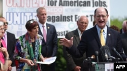 U.S. Rep. Brad Sherman of California and fellow Democrats in Congress hold a news conference to voice opposition to the Trans-Pacific Partnership trade deal and fast-track trade authority for the president in Washington, June 10, 2015.