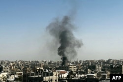 Smoke rises over Beit Lahia, adjacent to Jabalia in the northern Gaza Strip, Oct. 26, 2024.