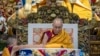 FILE - Tibetan spiritual leader the Dalai Lama sits on his ceremonial chair after he arrived at the Tsuglakhang temple to give a sermon at the request of a Buddhist group from Taiwan in Dharamshala, India, Sept. 30, 2024.