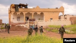 Tentara pemerintah Suriah di kota strategis Safira yang sebelumnya direbut pemberontak. (Foto: Dok)