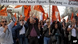 希腊示威者呼喊反紧缩的口号